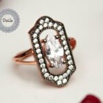 marquise ring with minimalist shuttle design and stackable band