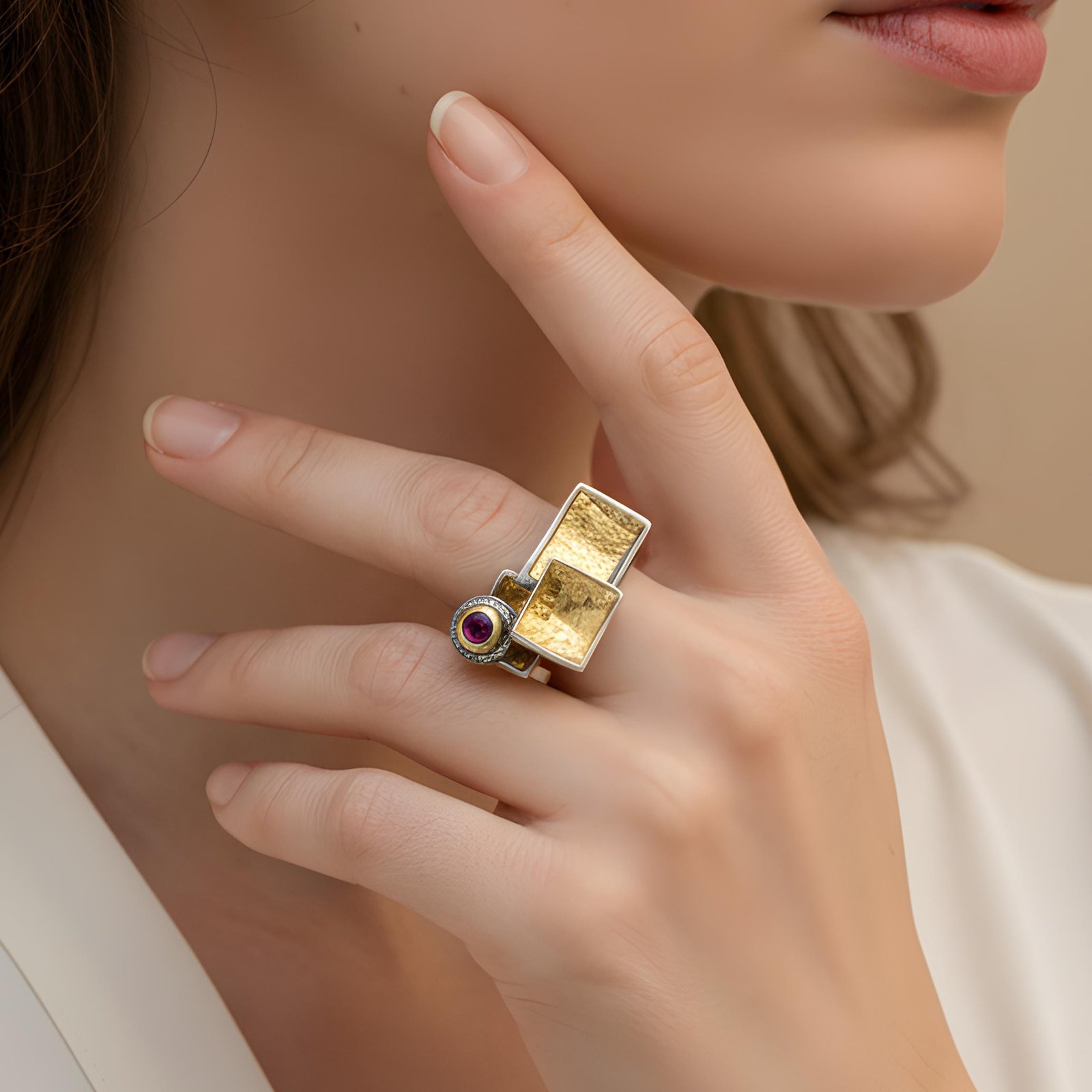22K gold garnet ring with faceted garnet and sterling silver