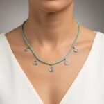 Natural turquoise necklace with sterling silver spiral charms